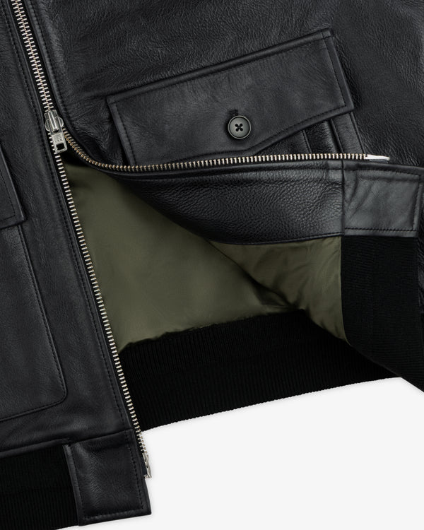 Napa Leather Bomber Jacket in black with a silver front zipper, buttoned chest pocket, and olive green lining.