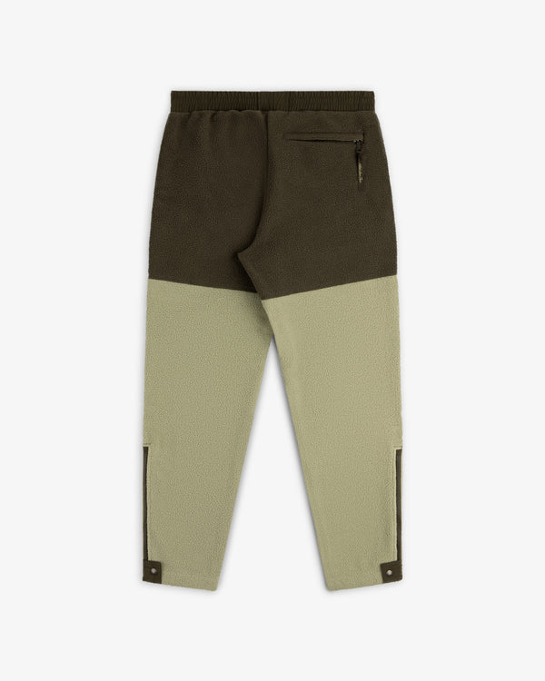 Back view of ALD/The North Face Denali Fleece Pant in olive/beige with elastic waistband and rear zipper pocket.
