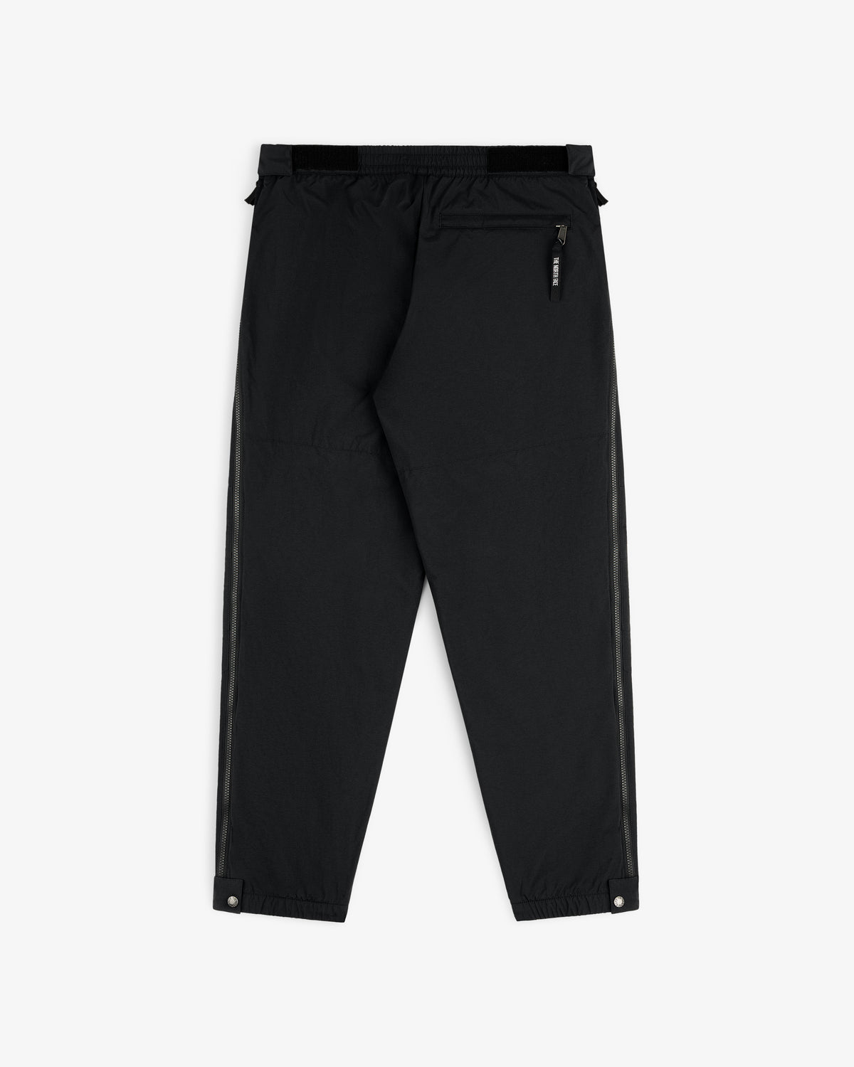 ALD/The North Face Nylon Denali Pant: black nylon with rear zip pocket, side stripes, elastic waist, snap-button cuffs.