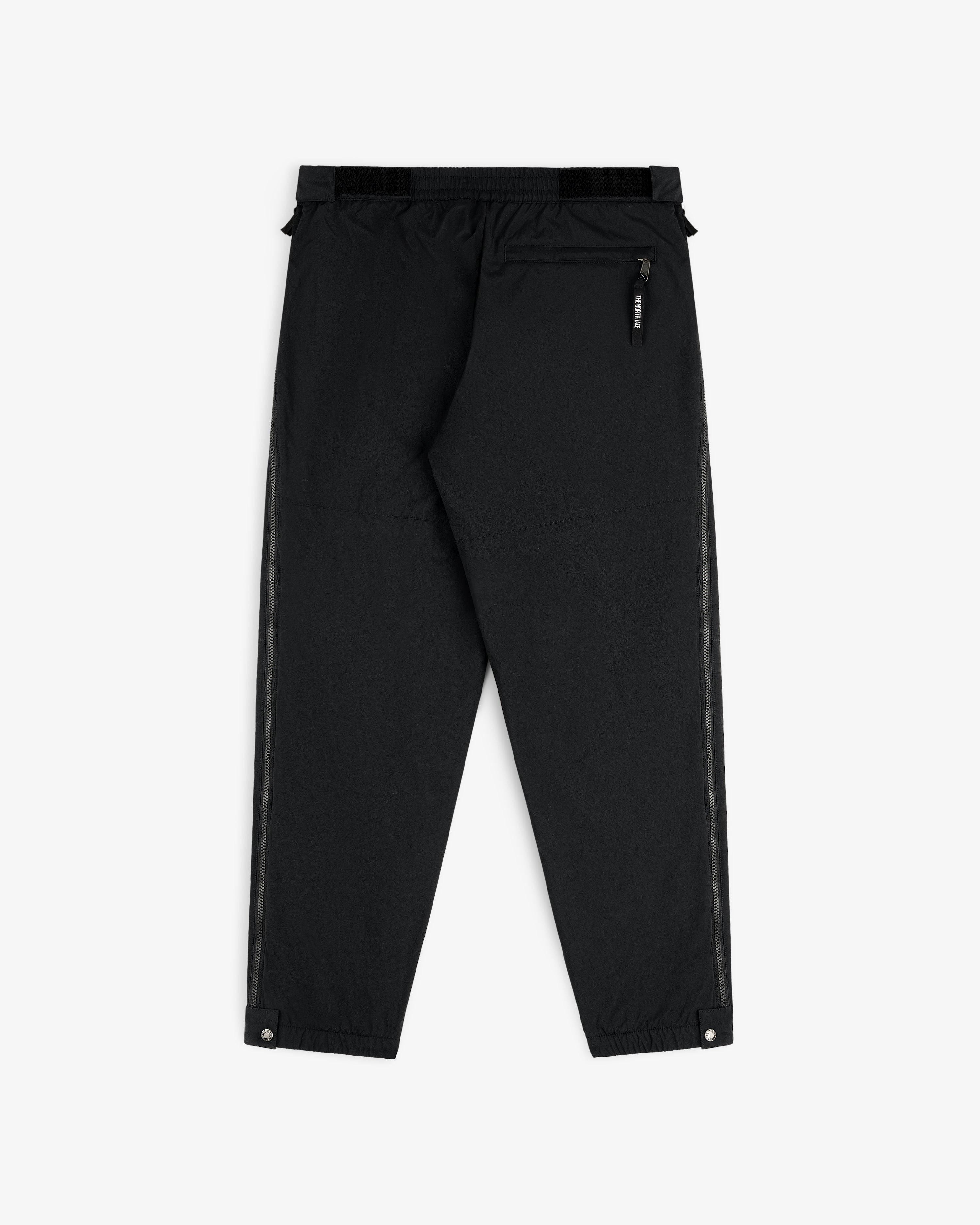 ALD/The North Face Nylon Denali Pant: black nylon with rear zip pocket, side stripes, elastic waist, snap-button cuffs.