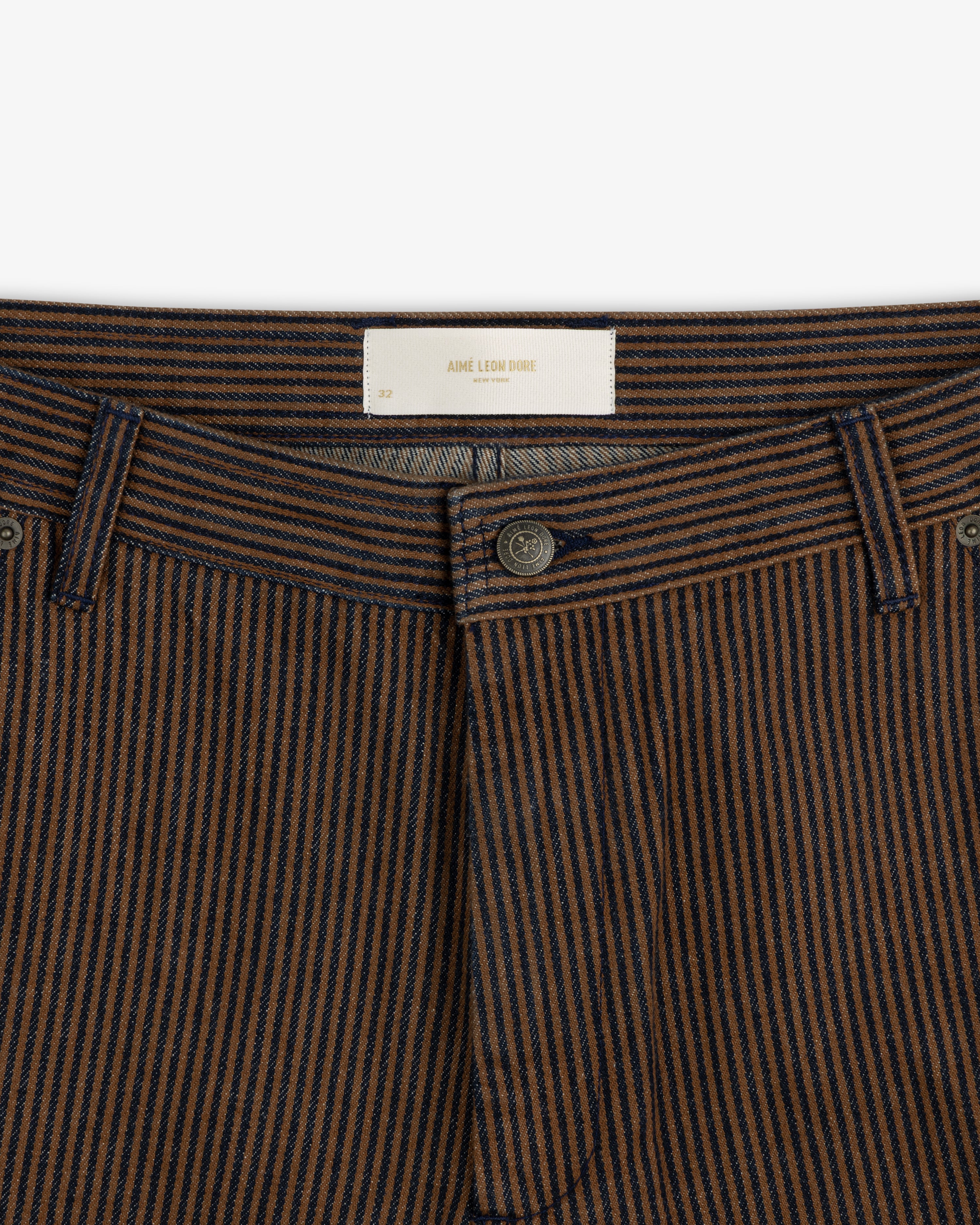 Hickory Stripe Painter Pant in brown and navy with belt loops, visible button, and white waistband label.