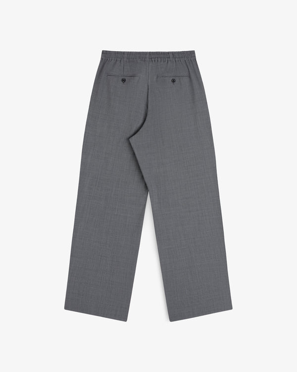 Houndstooth trousers with a straight-leg fit, elastic waist, and two buttoned back pockets, laid flat.