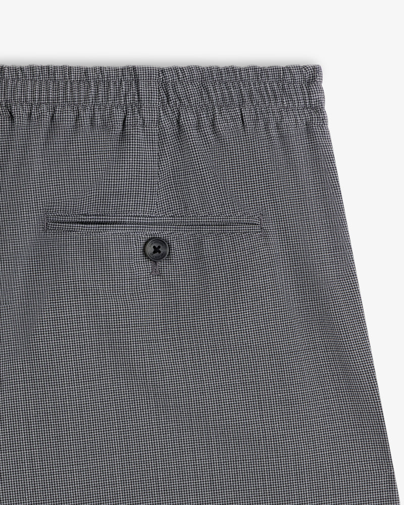 Houndstooth Elasticated Waist Trouser with single back pocket and black button.