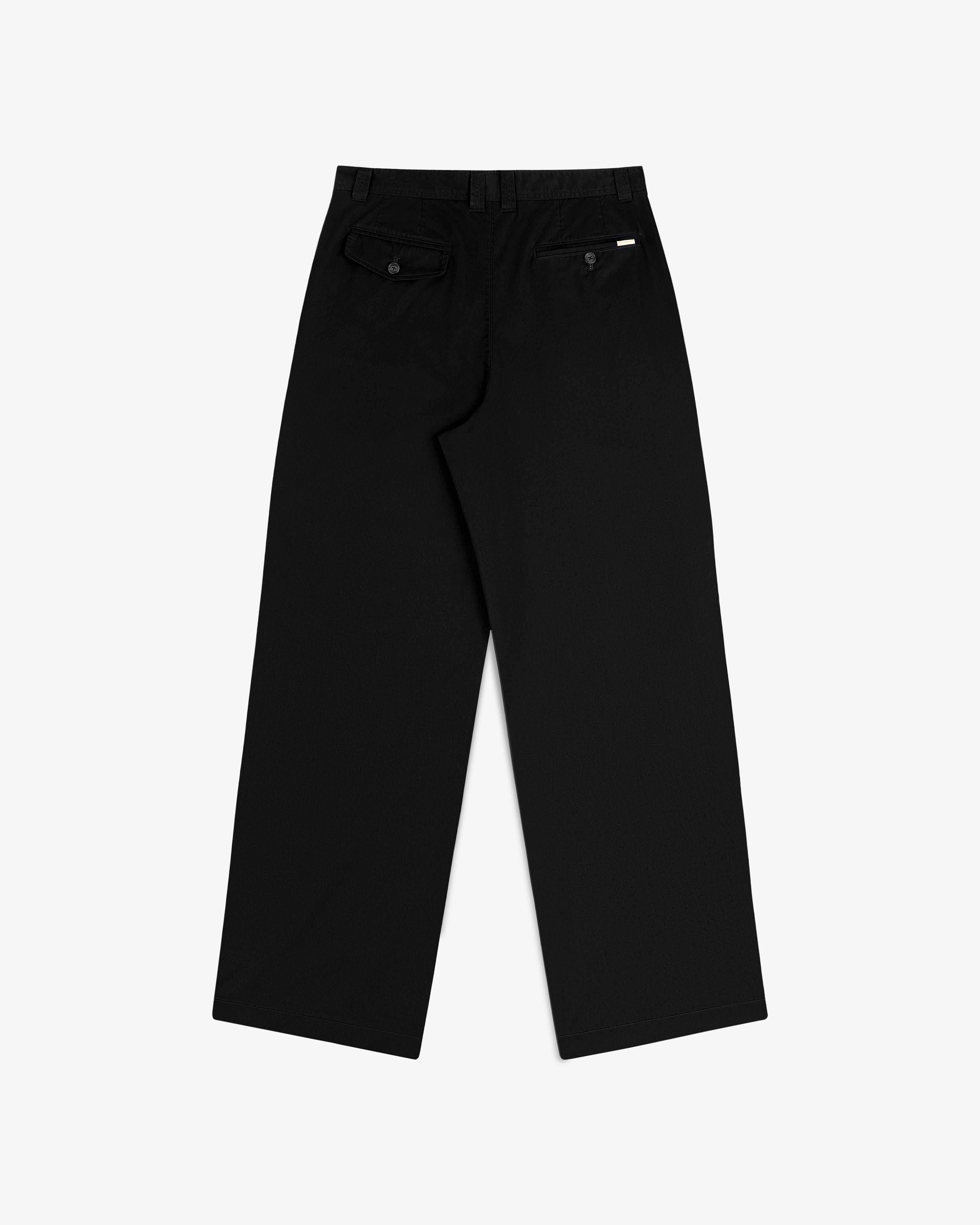 Double Pleated Officer Pant in black, wide-leg, back view with two buttoned pockets and a white label above right pocket.