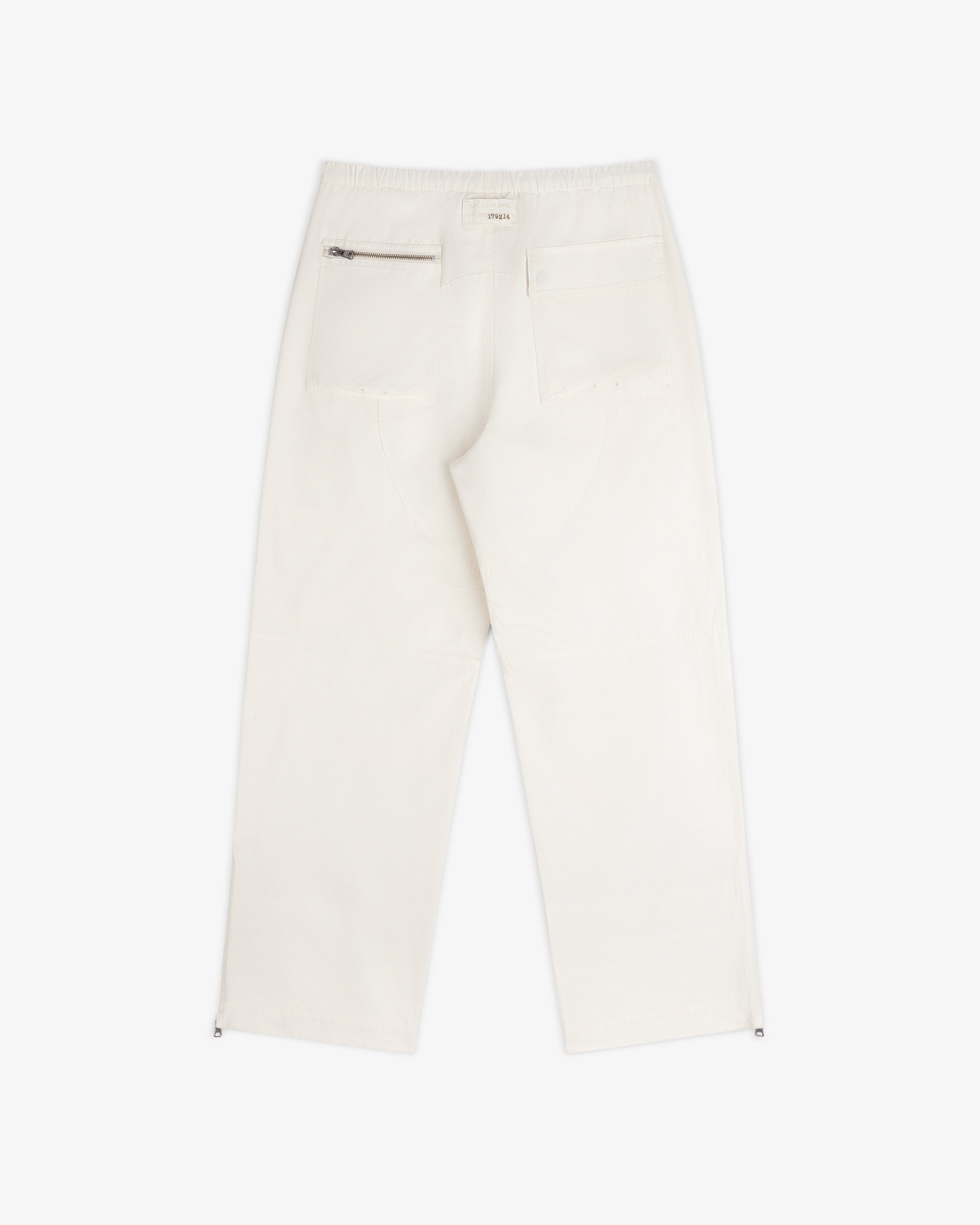 Back view of off-white Garment Washed Aviator Pant featuring an elastic waistband, zippered back pocket, and patch label.