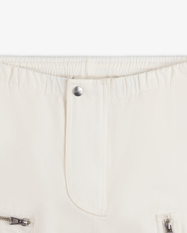 Garment Washed Aviator Pants in off-white with an elastic waistband, single silver button, and zippered pockets.