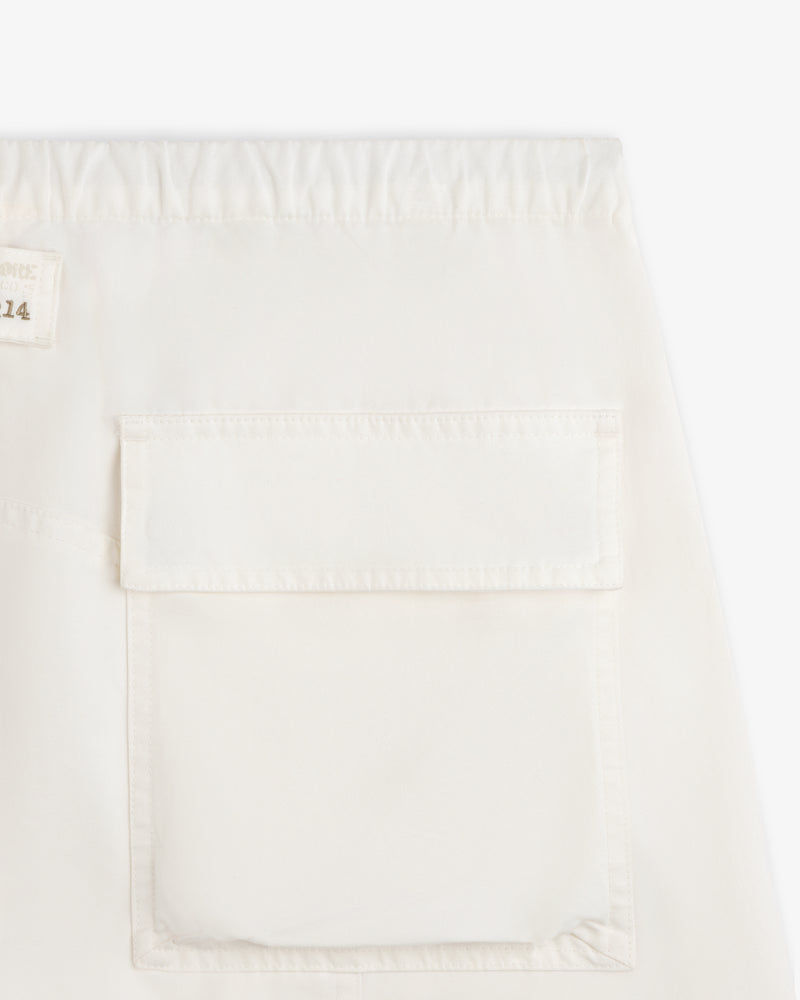 Garment Washed Aviator Pants in off-white with an elastic waistband and a large patch pocket on the leg.