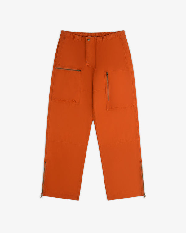 Burnt orange Garment Washed Aviator Pant with zippered cargo pockets on the thighs and zippers at the ankles.