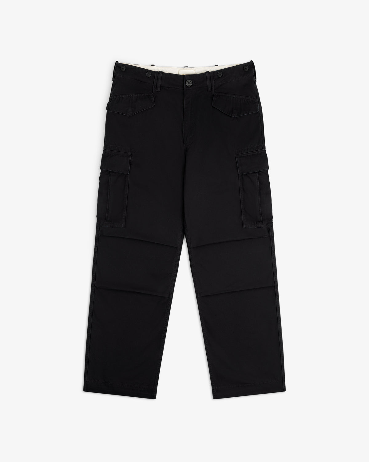 Fatigue Pant: black cargo style, straight leg, side pockets, front button closure, shown on white background.