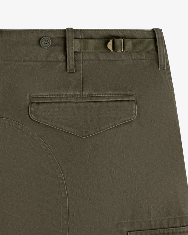 Close-up of Fatigue Pant in olive green with buttoned belt loop, side tab, and flap back pocket.
