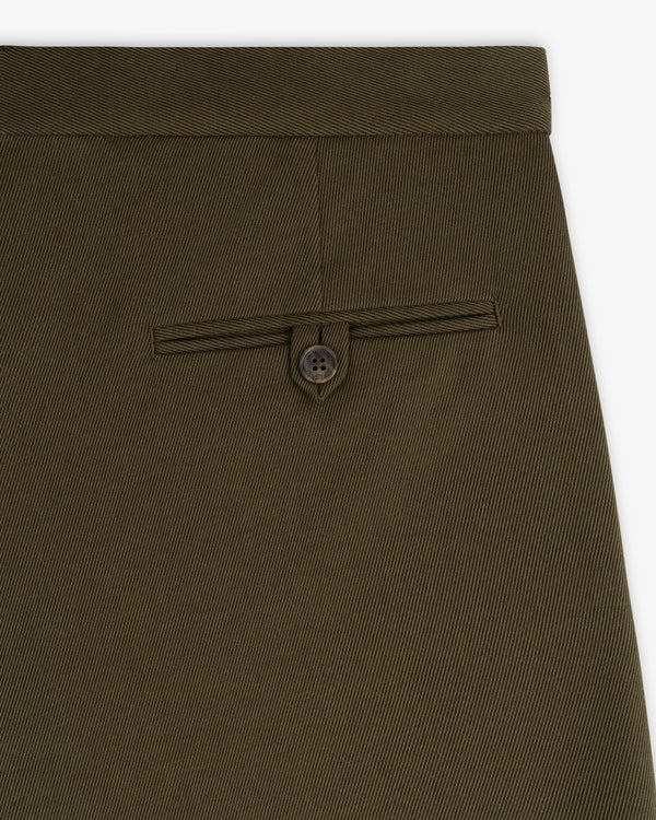 Close-up of olive Wool Blend Suit Trouser featuring a buttoned welt pocket.