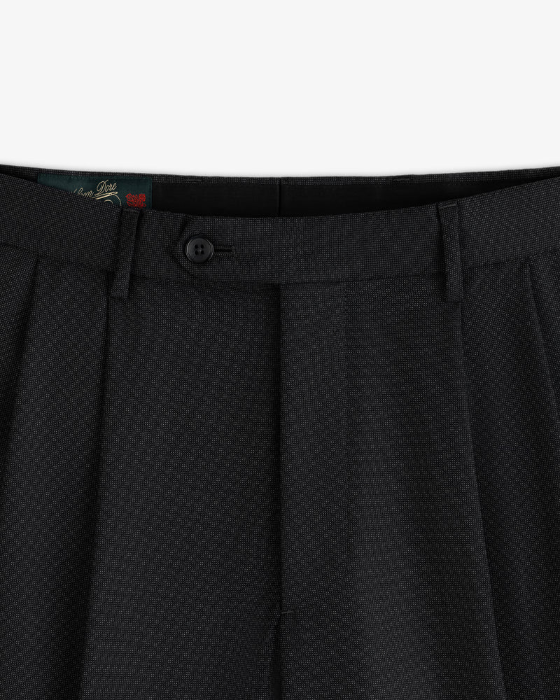 Close-up of the waistband and button closure of black Double Pleated Wool Jacquard Suit Trouser.