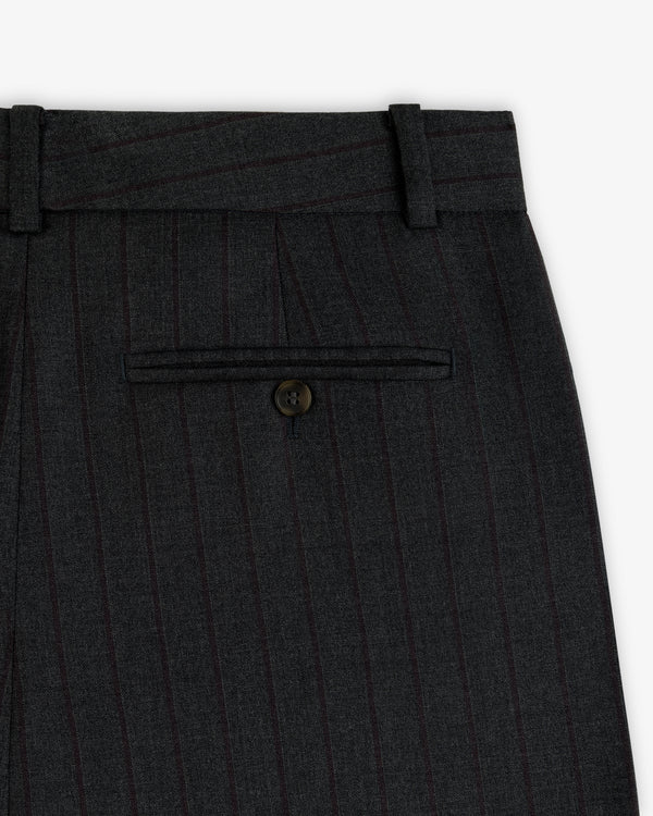 Striped Double Pleated Suiting Trouser in charcoal grey with pinstripes, a buttoned back welt pocket, and belt loops.