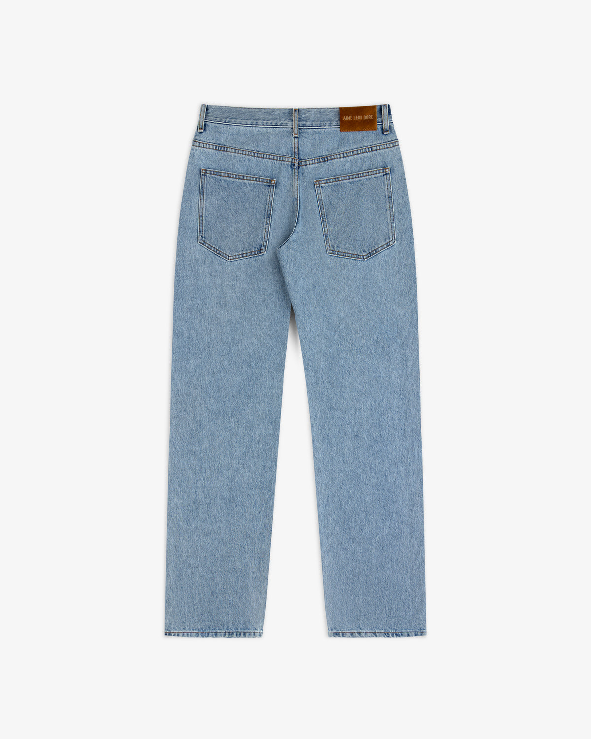 Back view of ALD Relaxed Fit Denim light-wash jeans featuring two back pockets and a leather logo patch on the waistband.