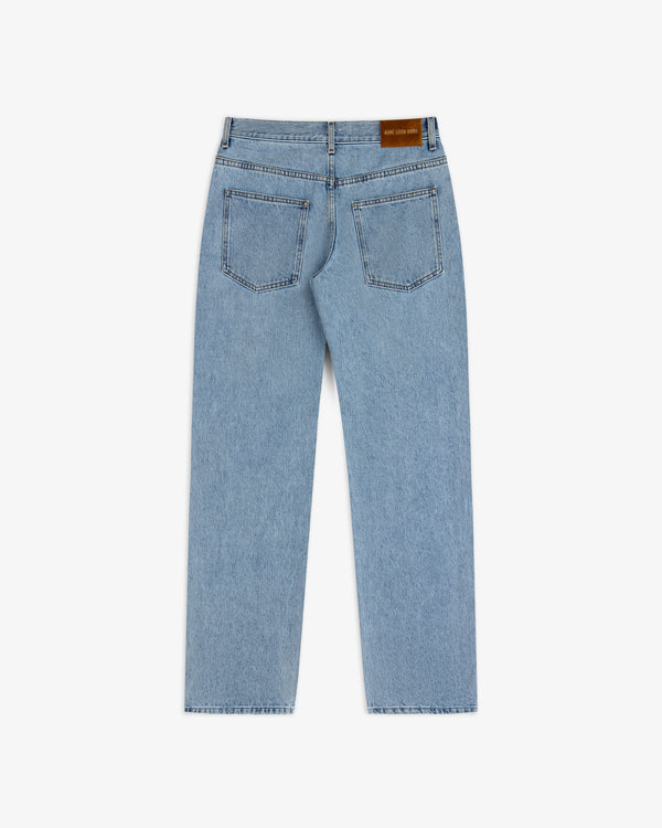 Back view of ALD Relaxed Fit Denim light-wash jeans featuring two back pockets and a leather logo patch on the waistband.
