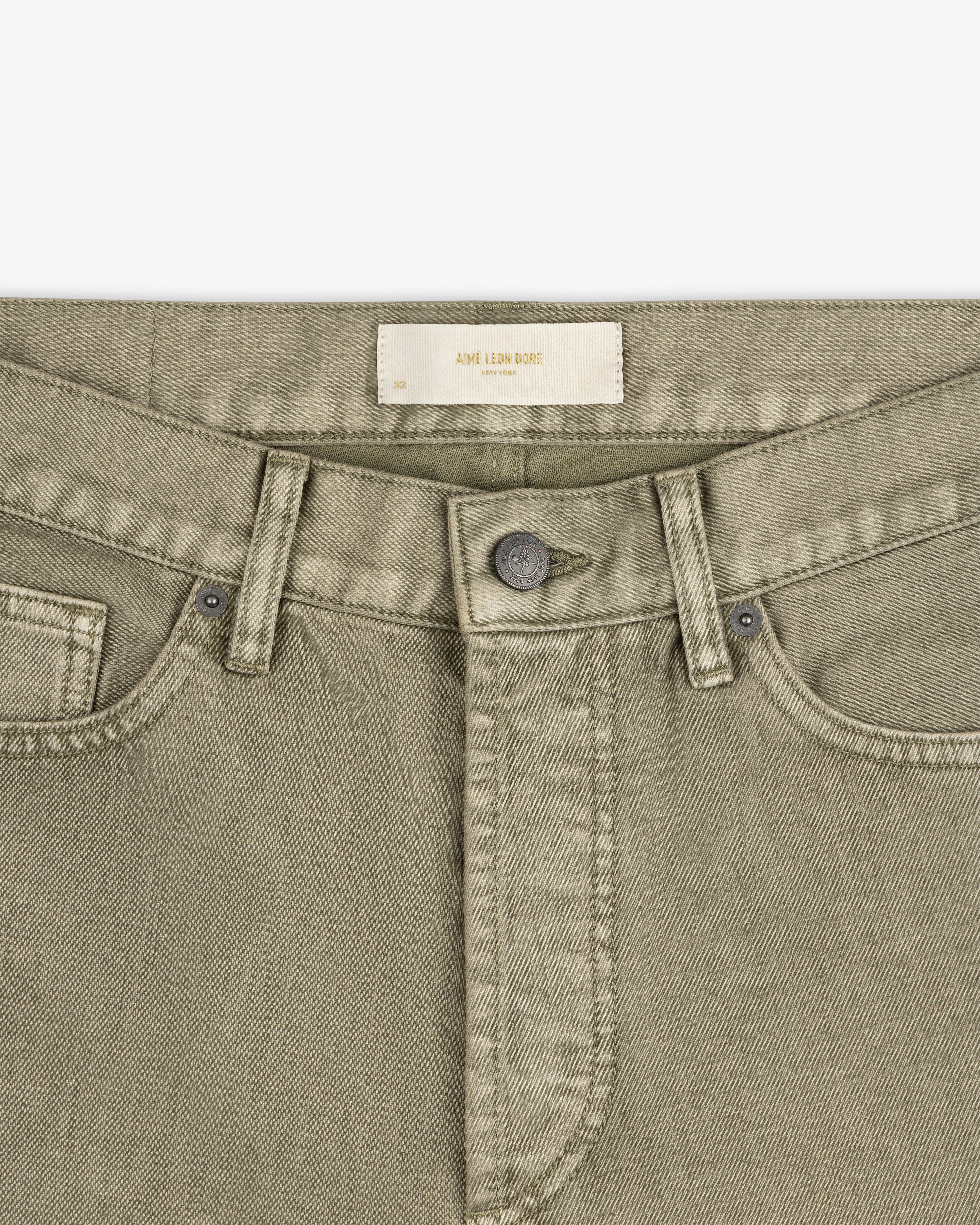 Flocked Straight Fit olive green denim jeans with a button fly and a branded waistband label.