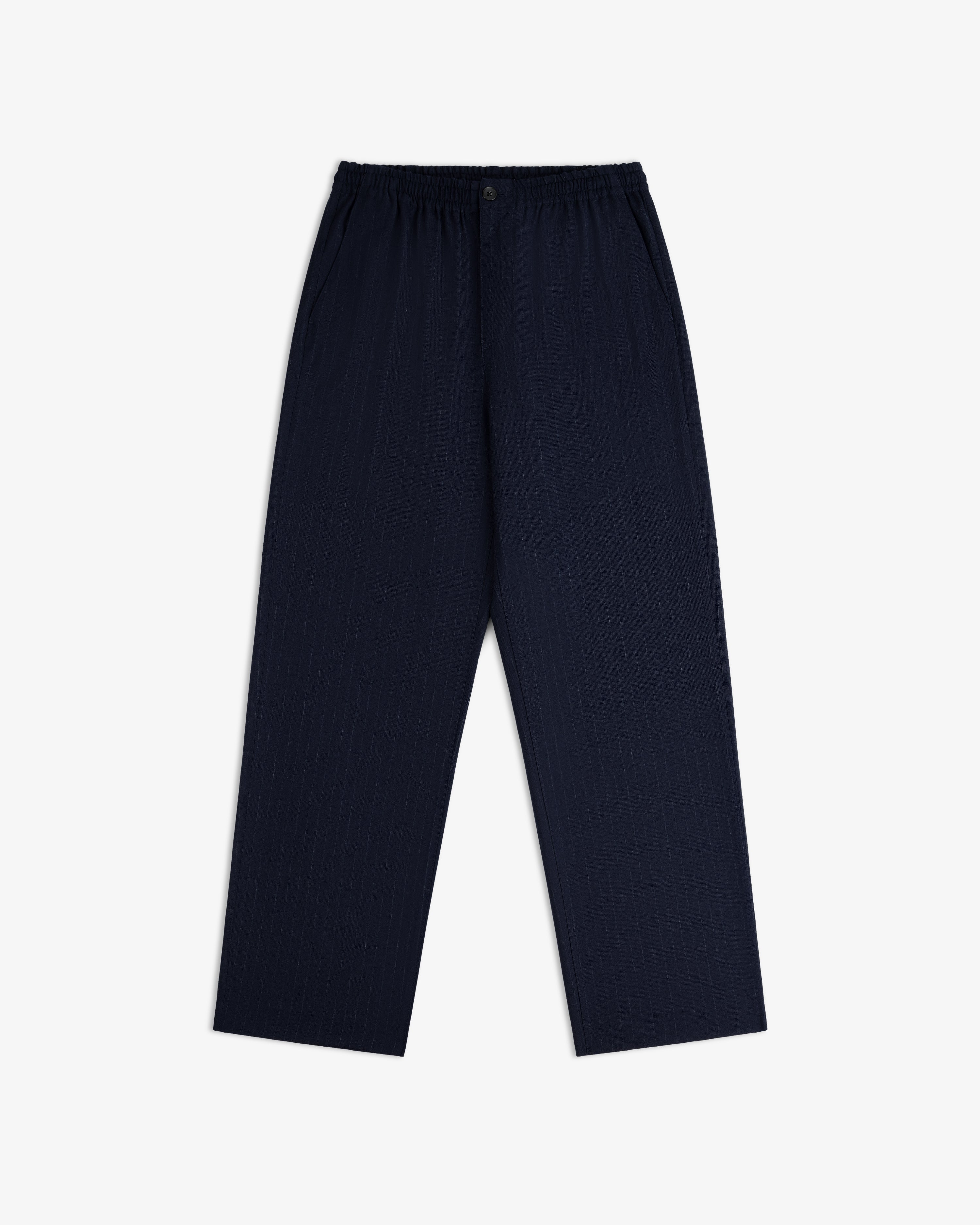 Wool Chalk Stripe Elasticated Waist Trouser in dark navy blue pinstripe with an elasticated waistband and button fly.