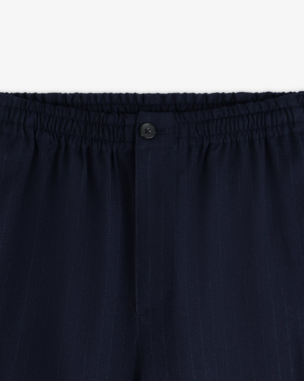 Wool Chalk Stripe Elasticated Waist Trouser in dark blue with an elasticated waistband and a single button fly.