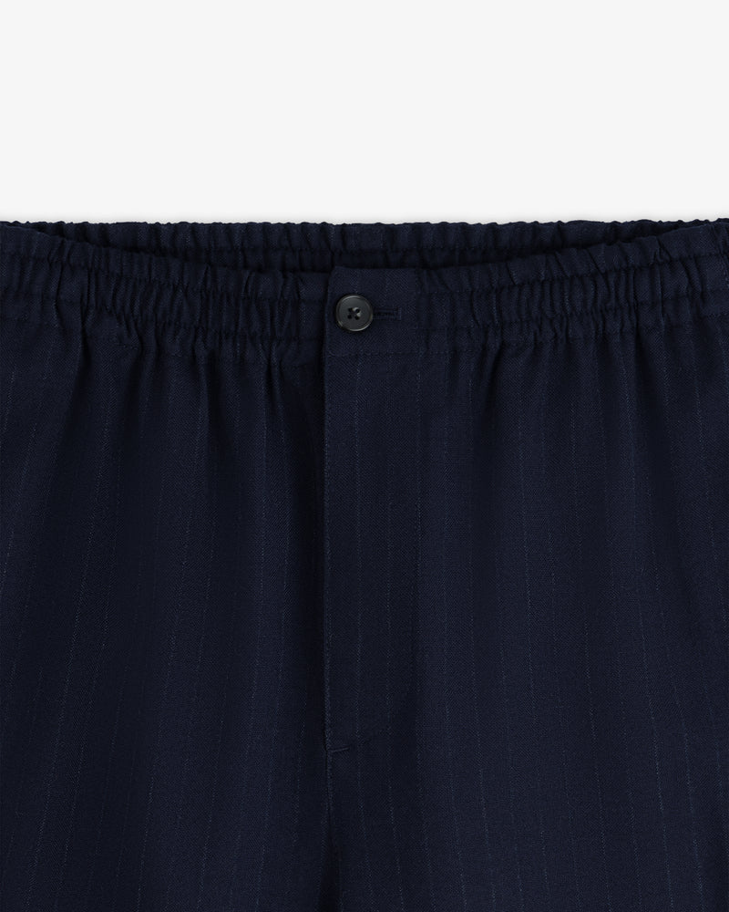 Wool Chalk Stripe Elasticated Waist Trouser in dark blue with an elasticated waistband and a single button fly.
