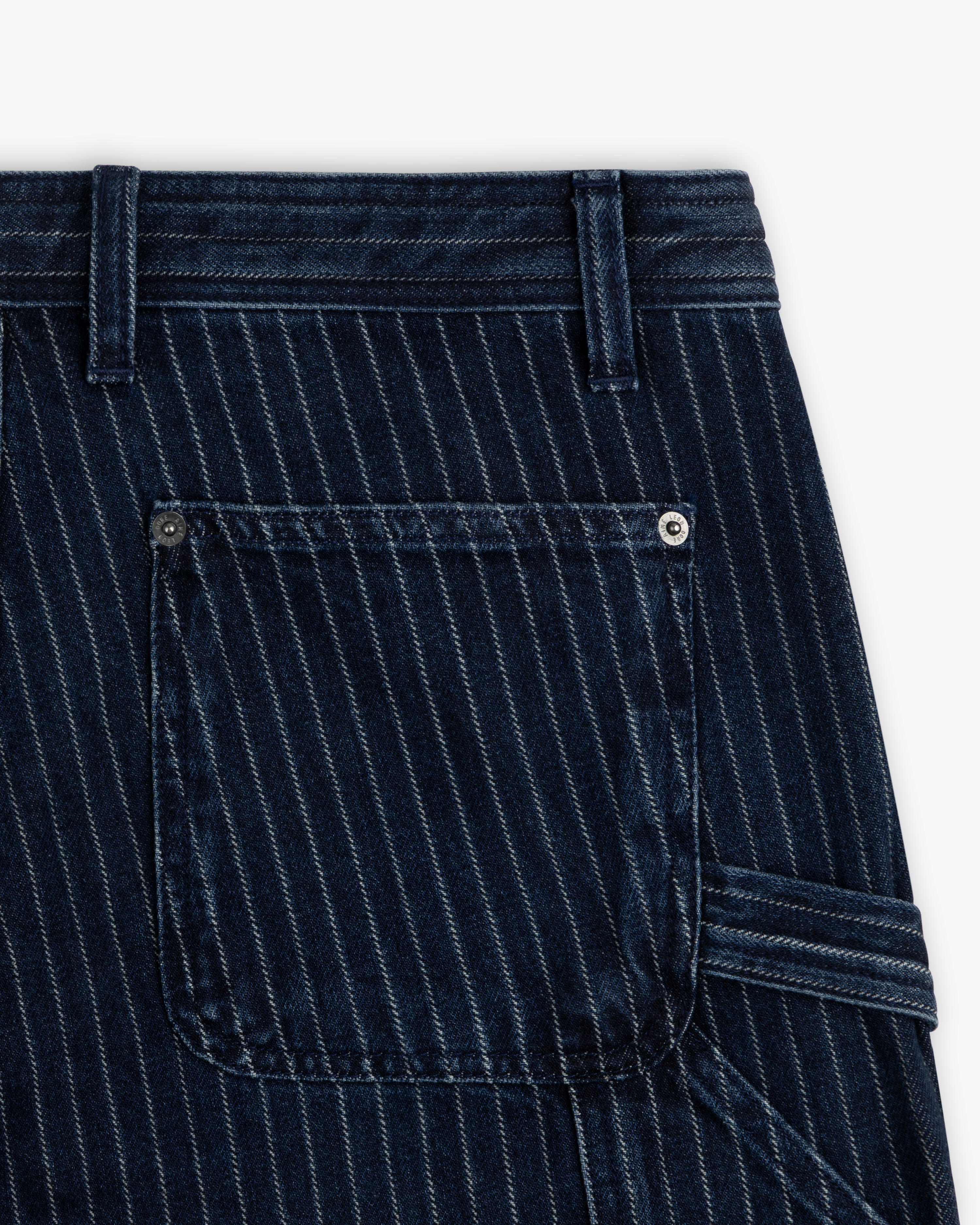 Close-up of Chalk Stripe Painter Pant in blue denim with white stripes, back pocket, belt loops, and hammer loop.