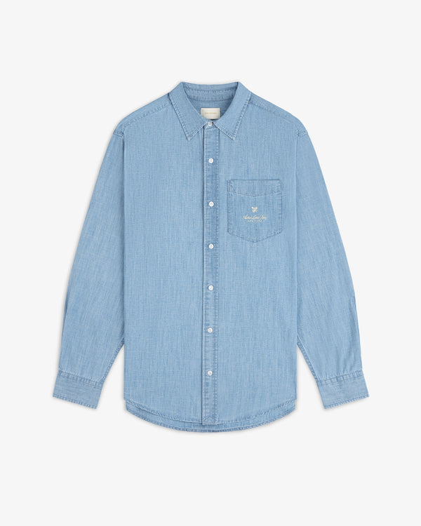 Bayard Chambray Shirt: Light blue, long sleeves, button-up, chest pocket with collar and subtle embroidered logo.