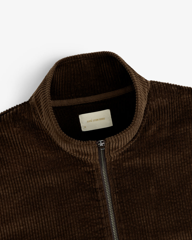 Brown Quarter Zip Corduroy Shirt with a high neck and front zipper.