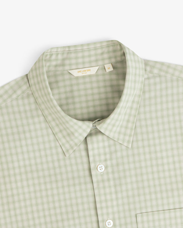 Plaid Casual Shirt in light green, size M, features a collar and button-up style. Shown from above.