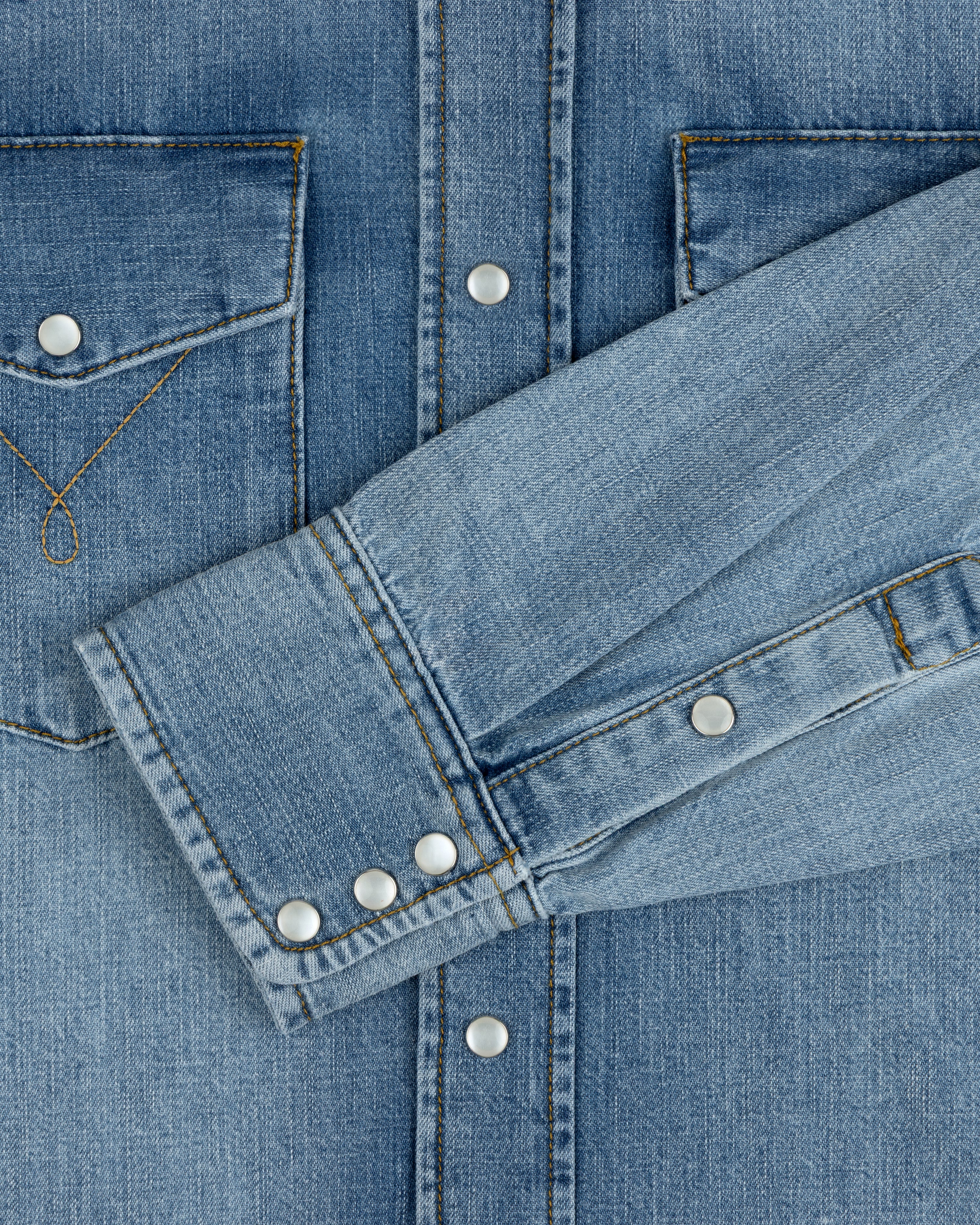 Denim Western Shirt in blue denim with snap buttons and a chest pocket.