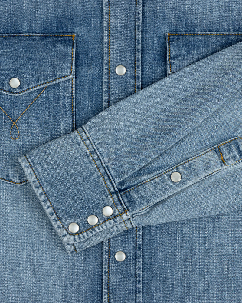Denim Western Shirt in blue denim with snap buttons and a chest pocket.