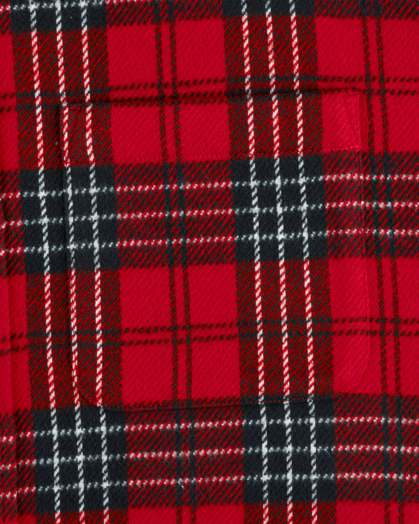 Close-up of a red, black, and white Yarn Dyed Plaid Overshirt featuring a chest pocket.