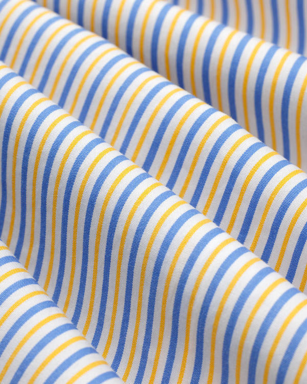 Striped Button Down Poplin Shirt fabric with vertical blue and yellow stripes folded in soft, deep waves.