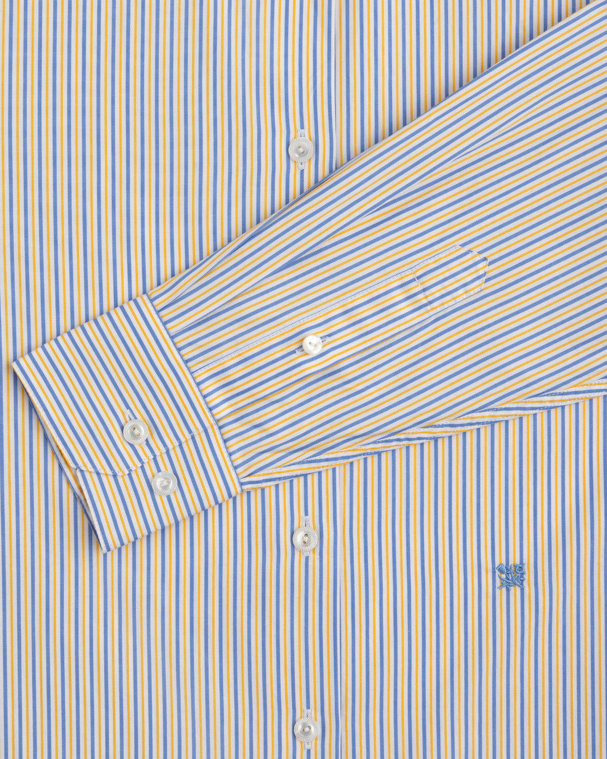 Striped Button Down Poplin Shirt with blue and yellow vertical stripes and a small blue embroidered emblem.