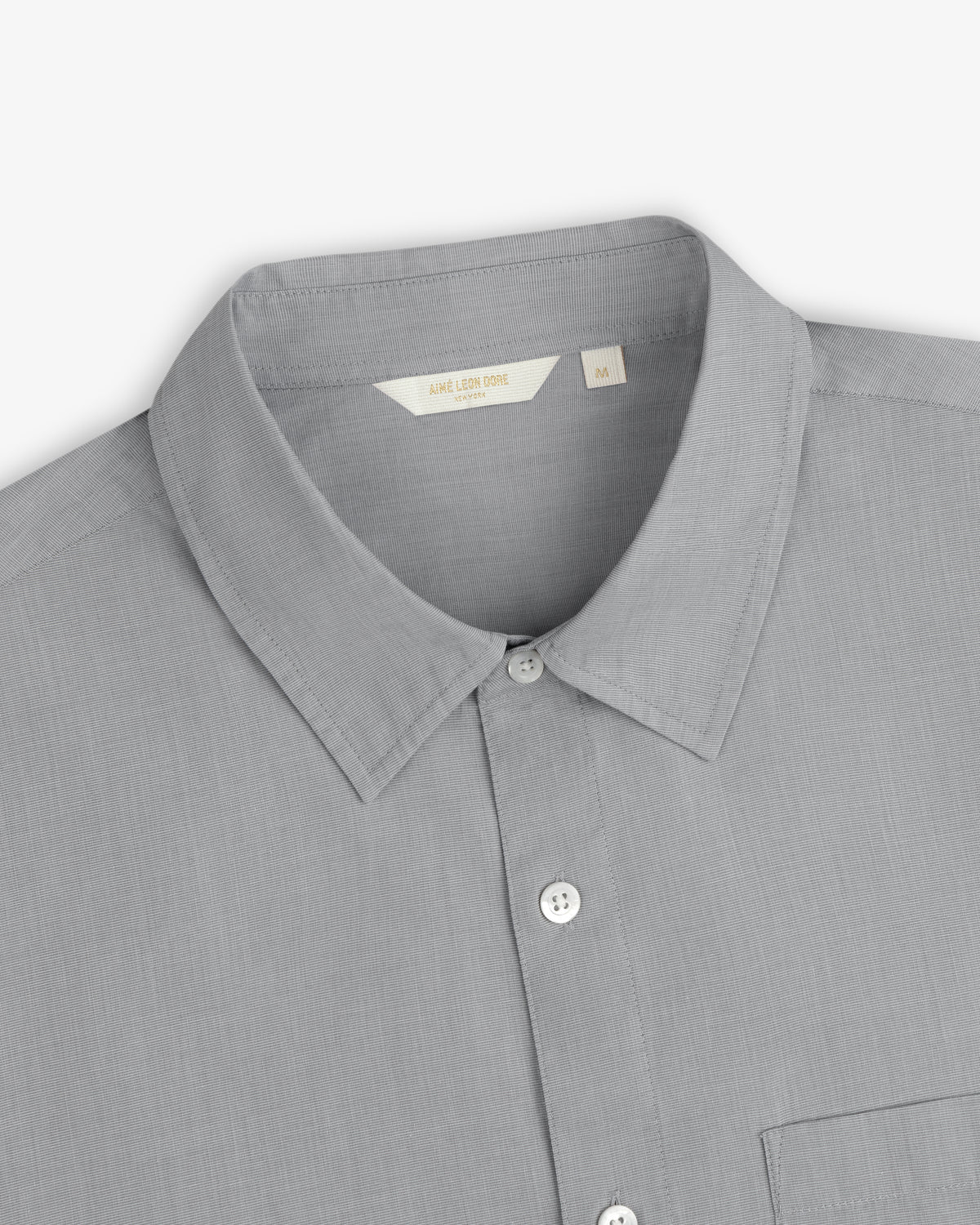 Poplin Casual Shirt in light gray with collar and pocket, shown flat on a white background.