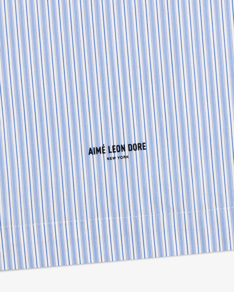 Poplin Casual Shirt in blue and white stripes with AIMÉ LEON DORE NEW YORK text embroidered in black.
