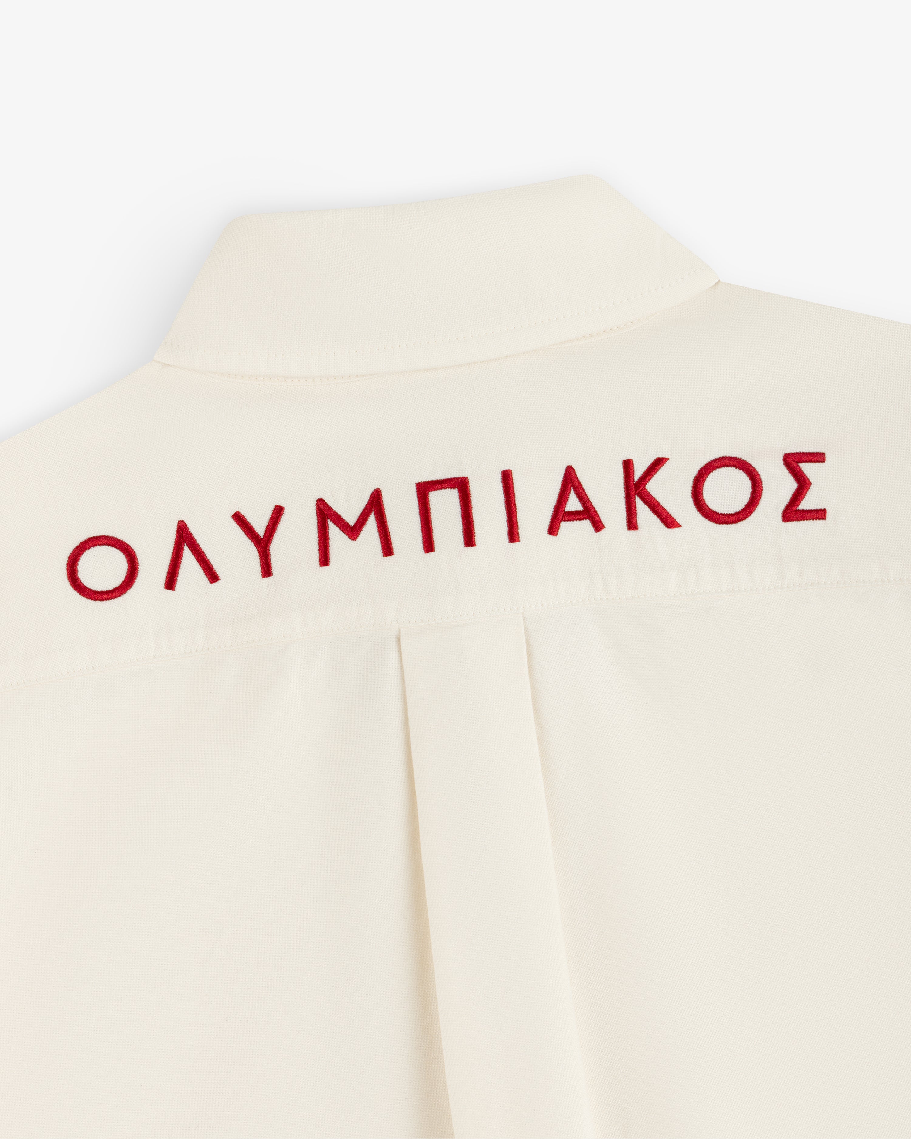 Off-white ALD / Olympiacos F.C. Logo Oxford Shirt with the word ΟΛΥΜΠΙΑΚΟΣ embroidered in red across the back yoke.