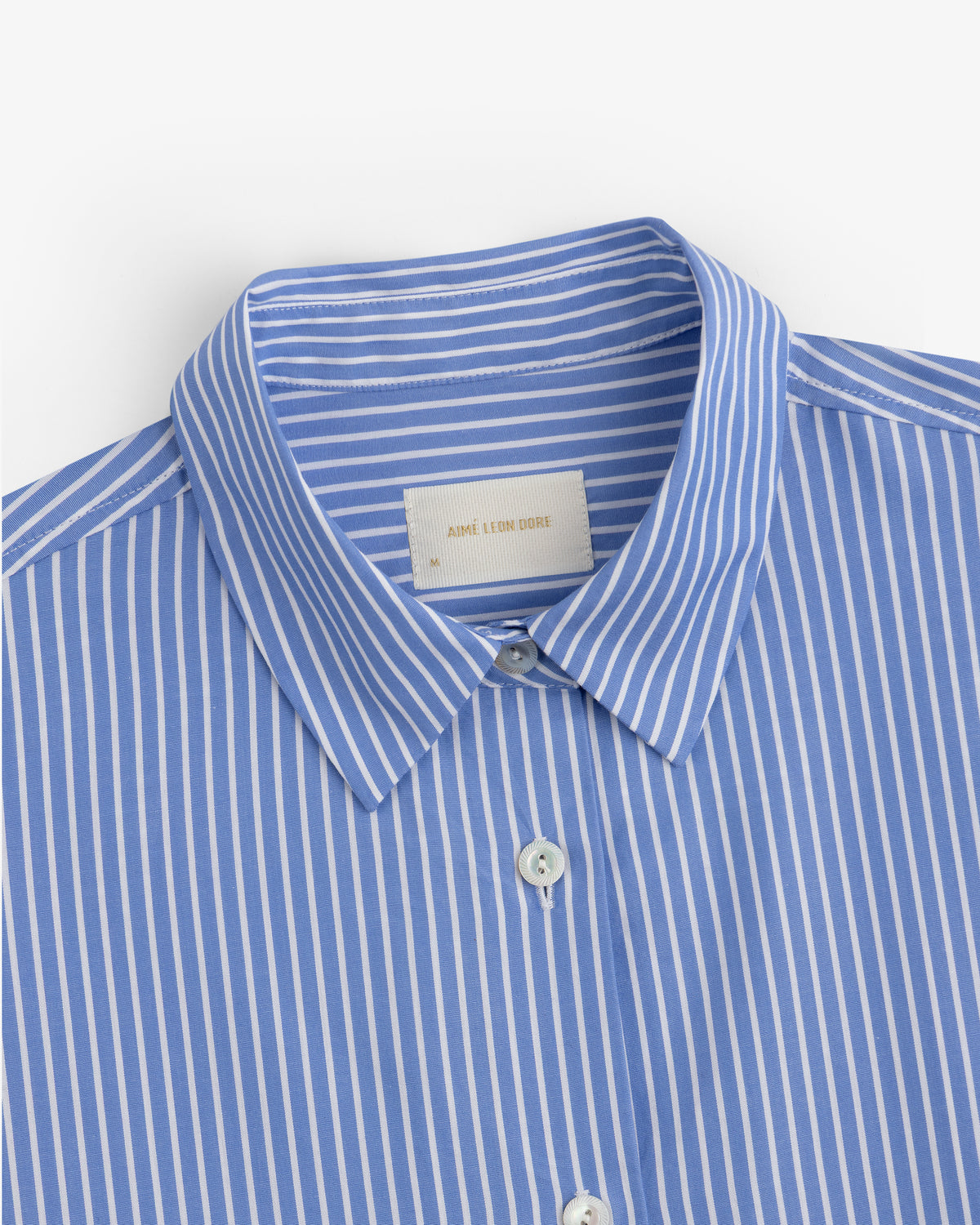 Striped Button Down Poplin Shirt in blue and white with a pointed collar.