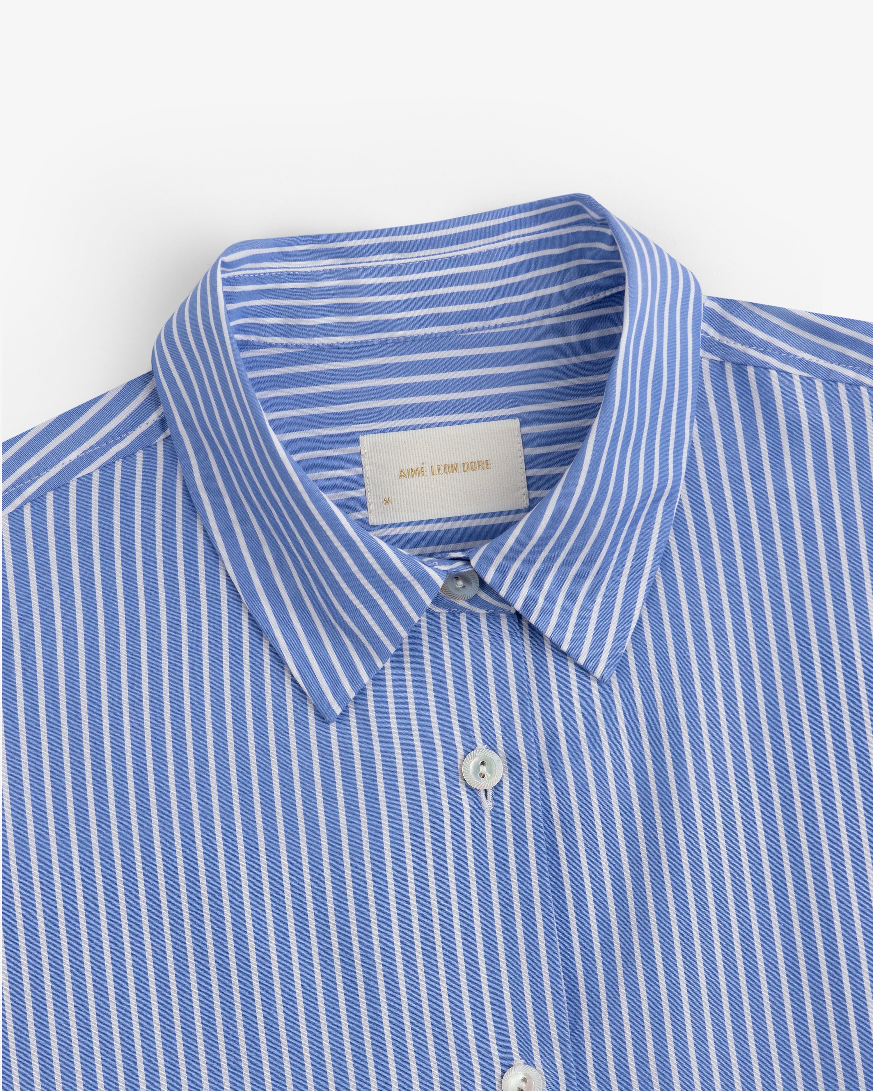 Striped Button Down Poplin Shirt in blue and white with a pointed collar.