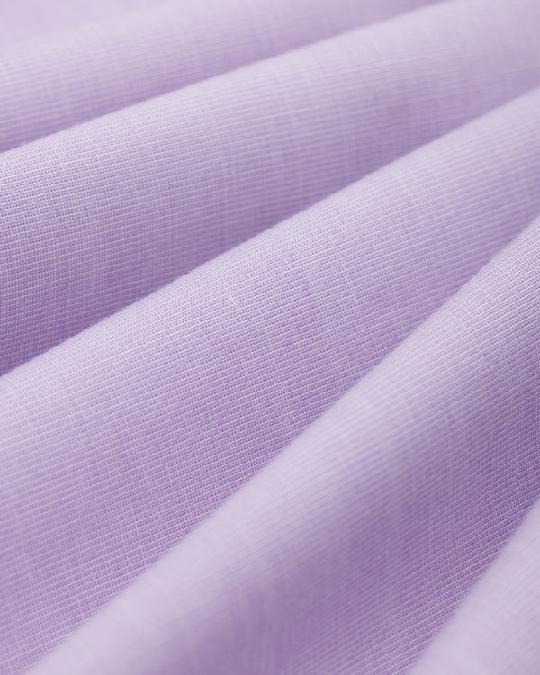 Close-up of folds in the light purple Button Down Poplin Shirt fabric.