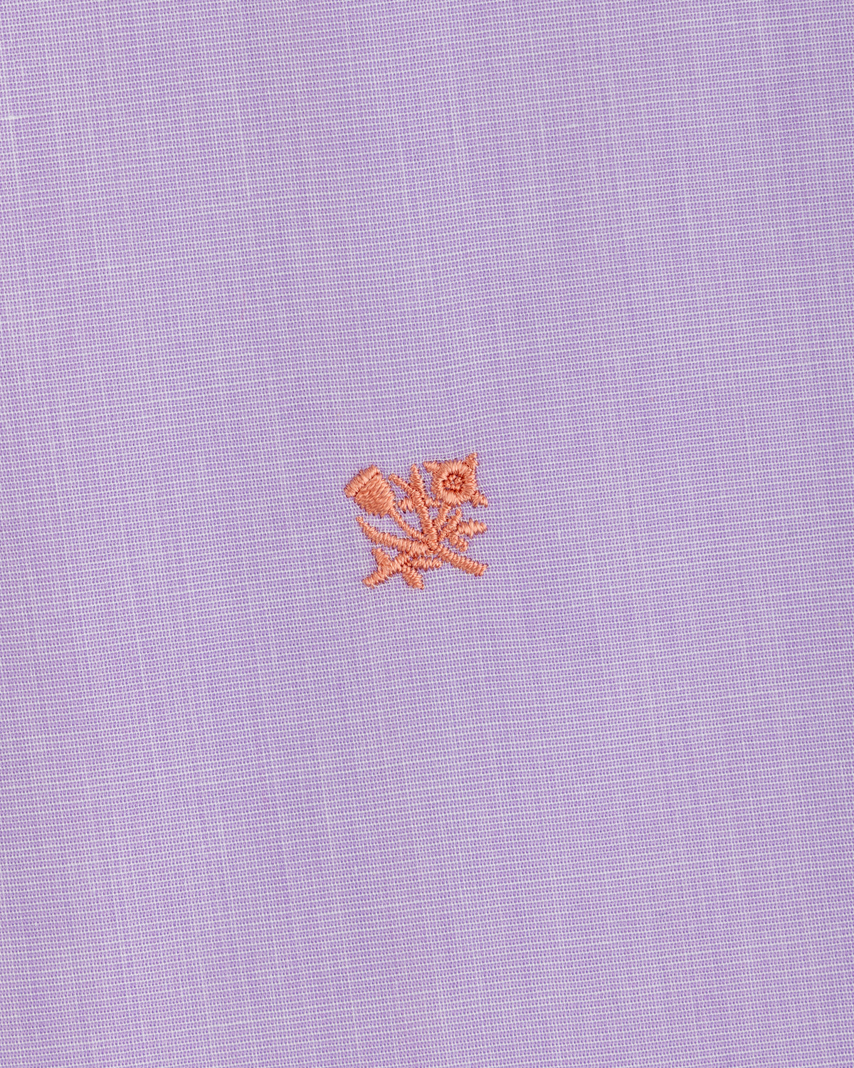 Button Down Poplin Shirt in light purple fabric featuring a small, embroidered coral-colored floral motif.