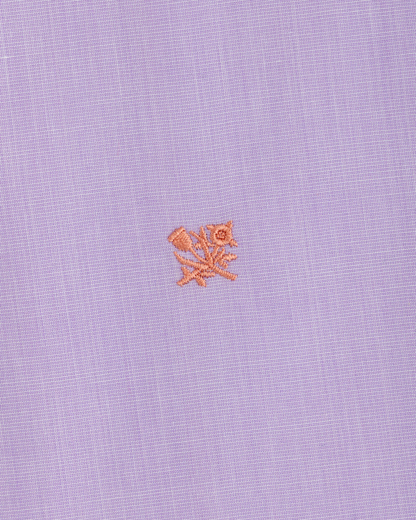 Button Down Poplin Shirt in light purple fabric featuring a small, embroidered coral-colored floral motif.