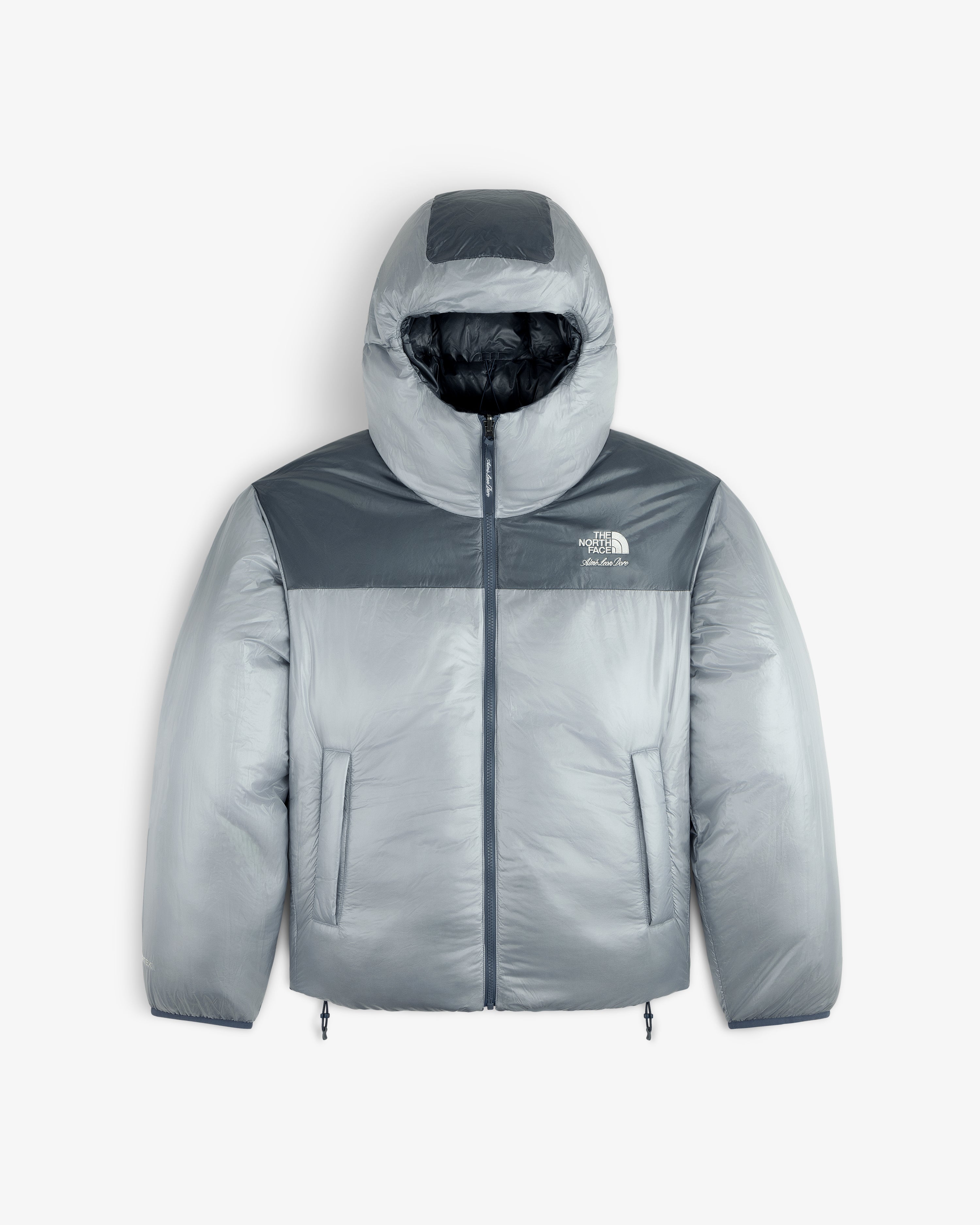 Gray ALD/The North Face Reversible Pertex® Nuptse Jacket with hood, zip closure, and two front pockets.