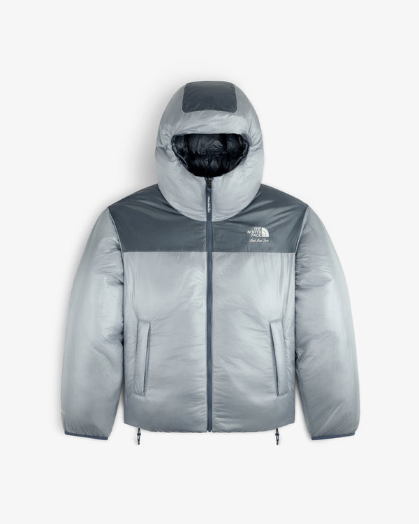 Gray ALD/The North Face Reversible Pertex® Nuptse Jacket with hood, zip closure, and two front pockets.