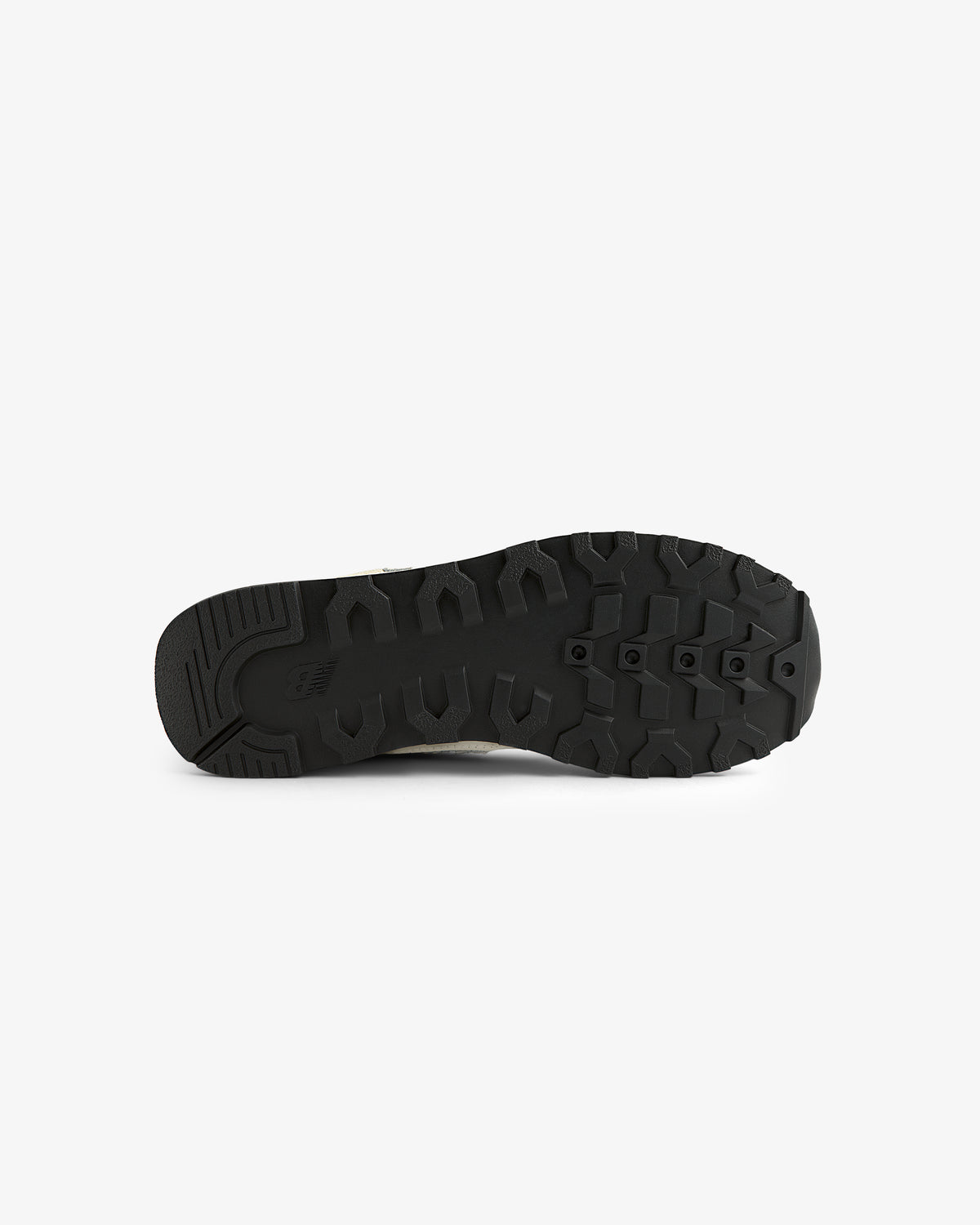 ALD / New Balance 475 black rubber sole with rugged tread, displayed on a plain white background.