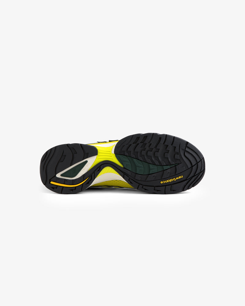 The black and yellow sole of the ALD / New Balance RC56 is shown against a white background.