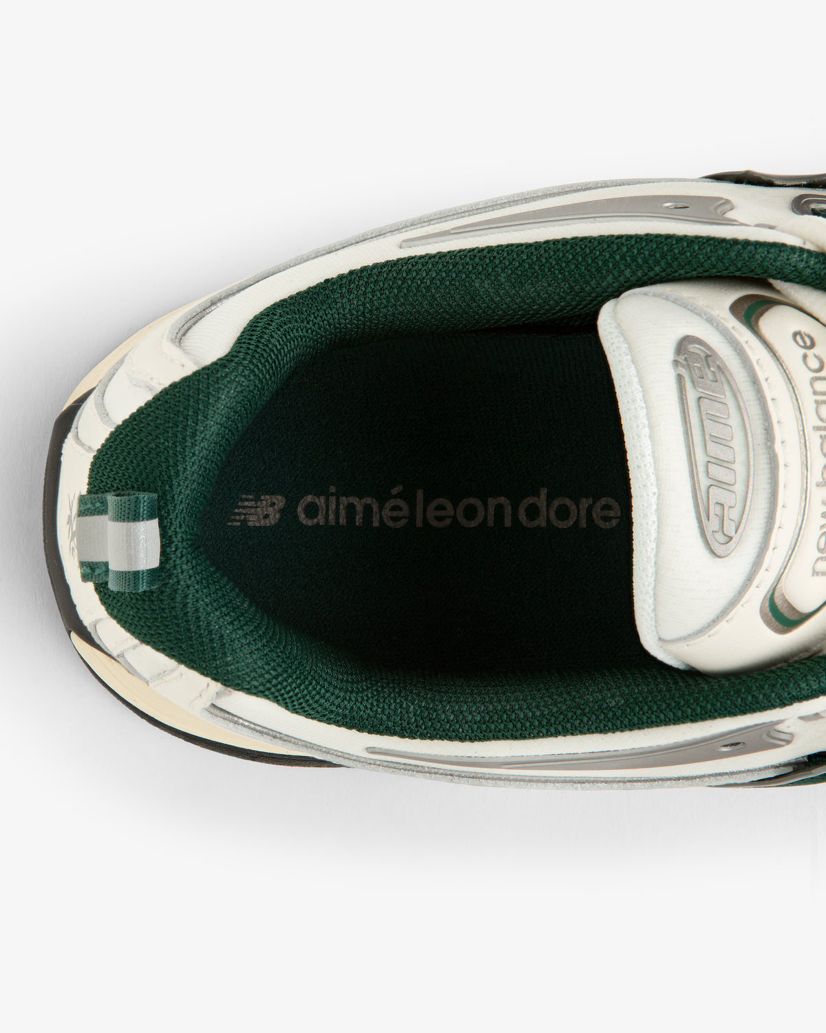 Top view of ALD / New Balance RC56 sneaker with green lining and Aimé Leon Dore branding on the insole.