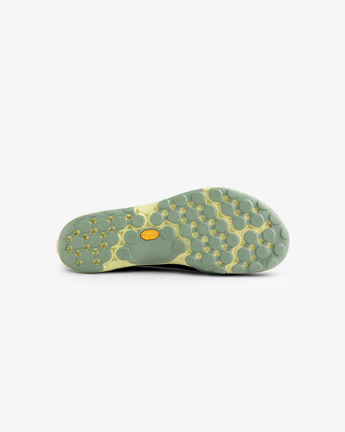 ALD / New Balance MT10T Sport Shoe with a light green and yellow sole featuring a textured hexagonal tread.
