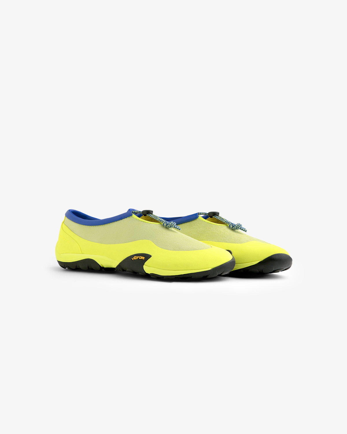 The ALD / New Balance MT10T Sport Shoe in yellow features black soles, blue trim, and patterned pull tabs.