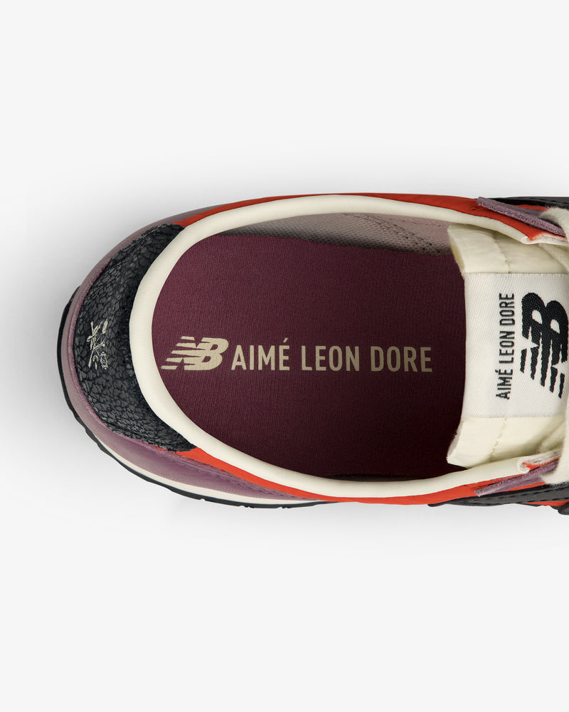 Top view of ALD / New Balance 471 with AIMÉ LEON DORE branding on the maroon insole and tongue.