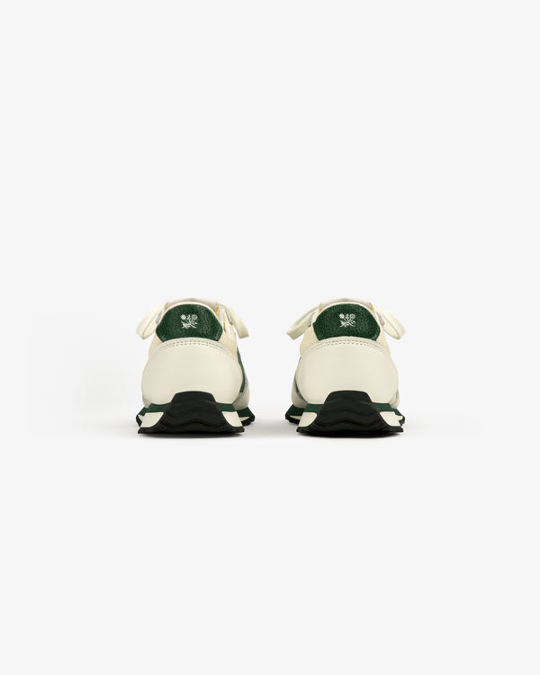ALD / New Balance 471 sneakers in green and white, shown from the back on a white background.
