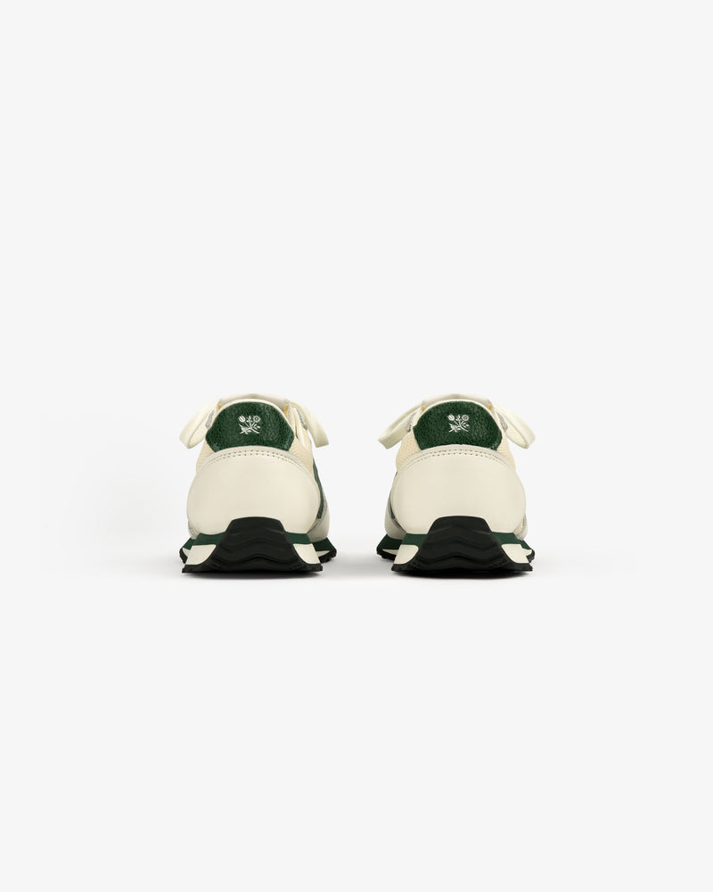 ALD / New Balance 471 sneakers in green and white, shown from the back on a white background.